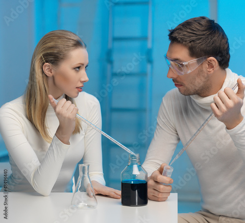 Photo: man and woman in laboratory man and woman in laboratory