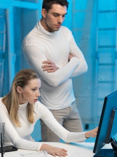 Photo: man and woman in laboratory man and woman in laboratory