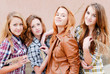 Photo: Four happy teenage friends Four happy teenage friends
