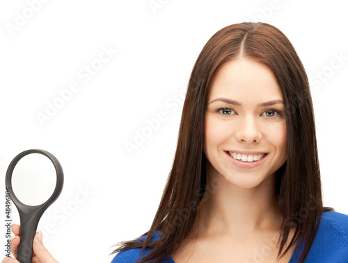 Photo: woman with magnifying glass woman with magnifying glass