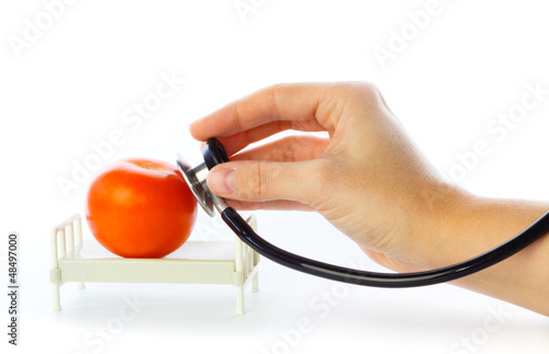 Photo: Tomato receives care in hospital bed Tomato receives care in hospital bed