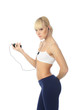 Athletic girl talking on the phone through the headset