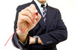 Businessman writing growing graph