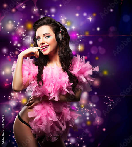 Photo: Sparking. Happy Woman Dancing - Fancy Dress Party. Disco Lights Sparking. Happy Woman Dancing - Fancy Dress Party. Disco Lights