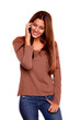 Charming young woman speaking on cellphone