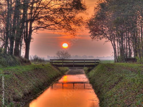 Photo: Sunset over bridge Sunset over bridge