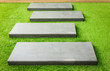 Photo: stone walk way on green grass stone walk way on green grass