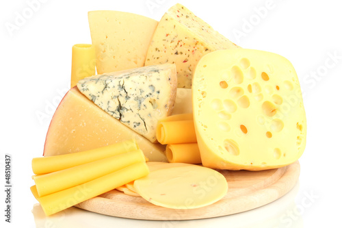 Photo: Various types of cheese isolated on white Various types of cheese isolated on white