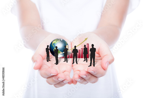 Photo: Hands hold Silhouettes of business with red graph and earth (Ele Hands hold Silhouettes of business with red graph and earth (Ele