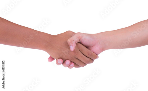 Photo: shaking hand of black and white isolated shaking hand of black and white isolated