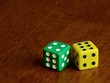 Foto: Two dices on wooden background Two dices on wooden background