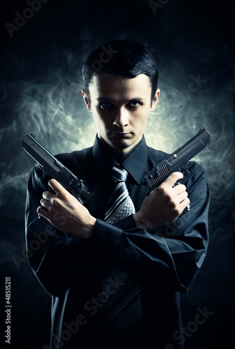 Photo: Killer with two pistols Killer with two pistols