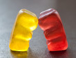 Two jelly bear on dark background. In Love.
