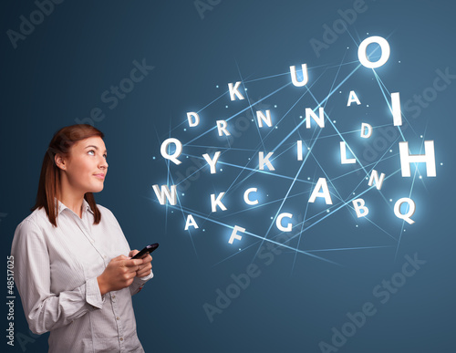Photo: Young woman typing on smartphone with high tech 3d letters commi Young woman typing on smartphone with high tech 3d letters commi