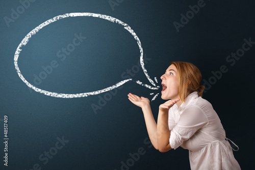 Photo: Young woman with modern speech bubble Young woman with modern speech bubble