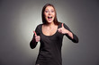 Photo: excited woman showing thumbs up excited woman showing thumbs up