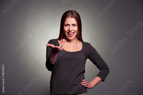 Photo: displeased young woman displeased young woman
