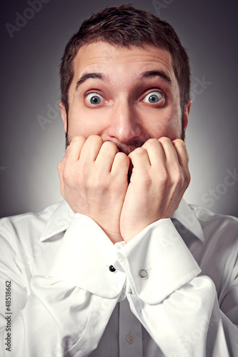 Photo: excited man have a fear of something excited man have a fear of something