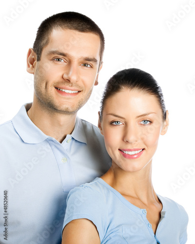 Photo: Happy smiling young couple, on white Happy smiling young couple, on white