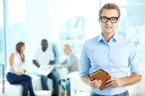 Photo: Man with notepad Man with notepad