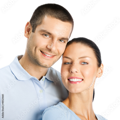 Photo: Happy smiling young couple, on white Happy smiling young couple, on white