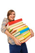 Photo: Teenage girl struggling with stack of books Teenage girl struggling with stack of books