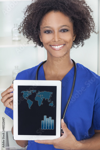 Photo: African American Female Doctor With Tablet Computer African American Female Doctor With Tablet Computer