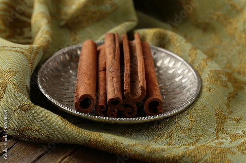Photo: Cinnamon sticks and powder cinnamon Cinnamon sticks and powder cinnamon