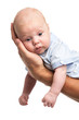 Father holding baby son over white, closeup view