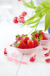 canvas print picture - Fresh red strawberries and pink tulips