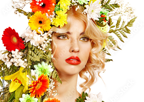 Photo: Woman with make up and flower. Woman with make up and flower.