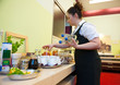 Waitress serving breakfast