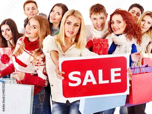 Photo: Group people with board sale. Group people with board sale.