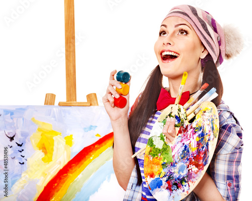 Photo: Female artist at work. Female artist at work.