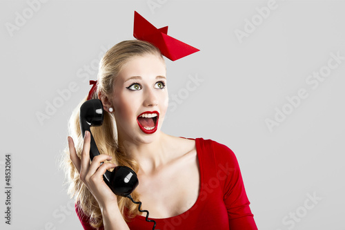 Photo: Fashion woman with a phone Fashion woman with a phone