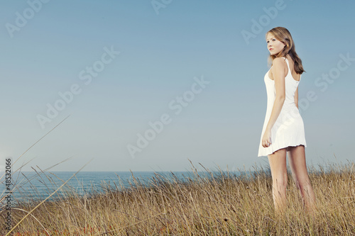 Photo: Woman in a white dress Woman in a white dress