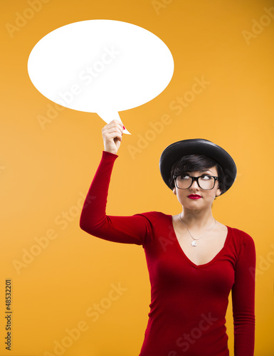 Photo: Girl holding a thought ballon Girl holding a thought ballon