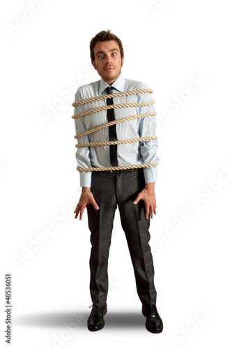Photo: Businessman tied up with rope Businessman tied up with rope