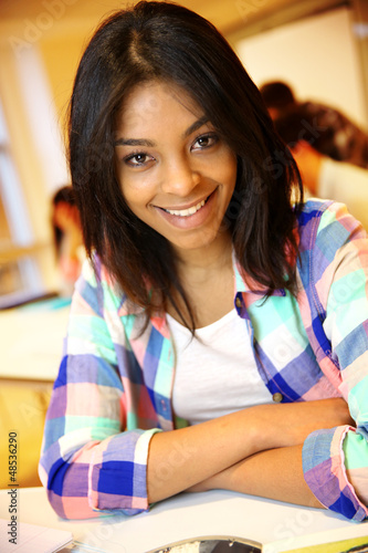 Photo: Portrait of smiling student girl Portrait of smiling student girl