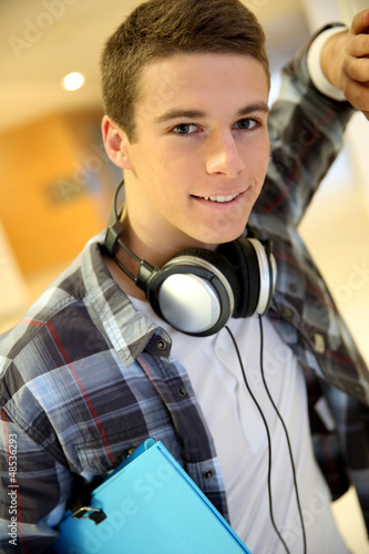 Photo: Trendy young student boy with music headphones Trendy young student boy with music headphones