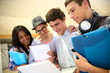 Group of students standing in school hallway