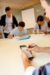 Student in class using palmtop