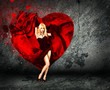 Woman with Splashing Heart on Dark Background