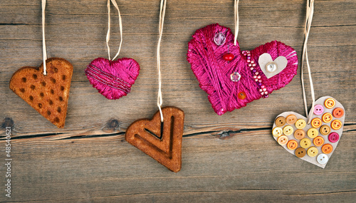 Photo: Heart shaped cookie and red handmade heart Heart shaped cookie and red handmade heart