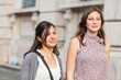 Two Young Women Walking in the City