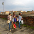 Beautiful Young Women Walking in the City with Shopping Bags