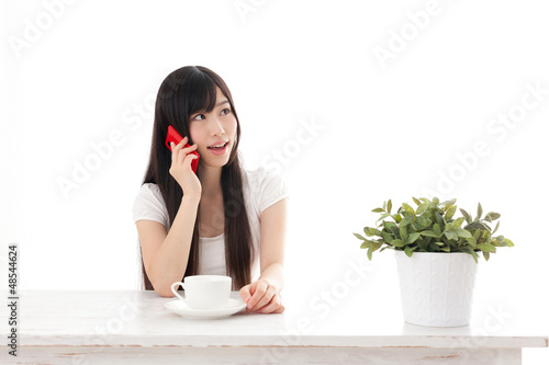 Photo: attractive asian woman using smart phone attractive asian woman using smart phone