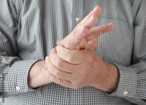 Photo: man with numbness in hand man with numbness in hand