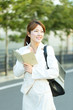 Beautiful asian businesswoman in the town