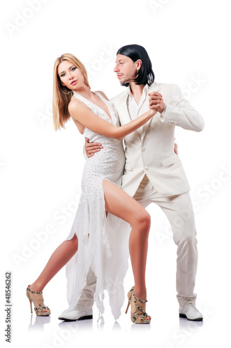 Photo: Pair dancing dances isolated on white Pair dancing dances isolated on white